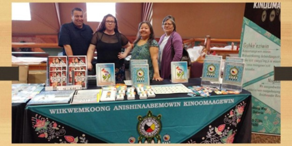 Table promoting language immersion programming in Wiikwemkong.